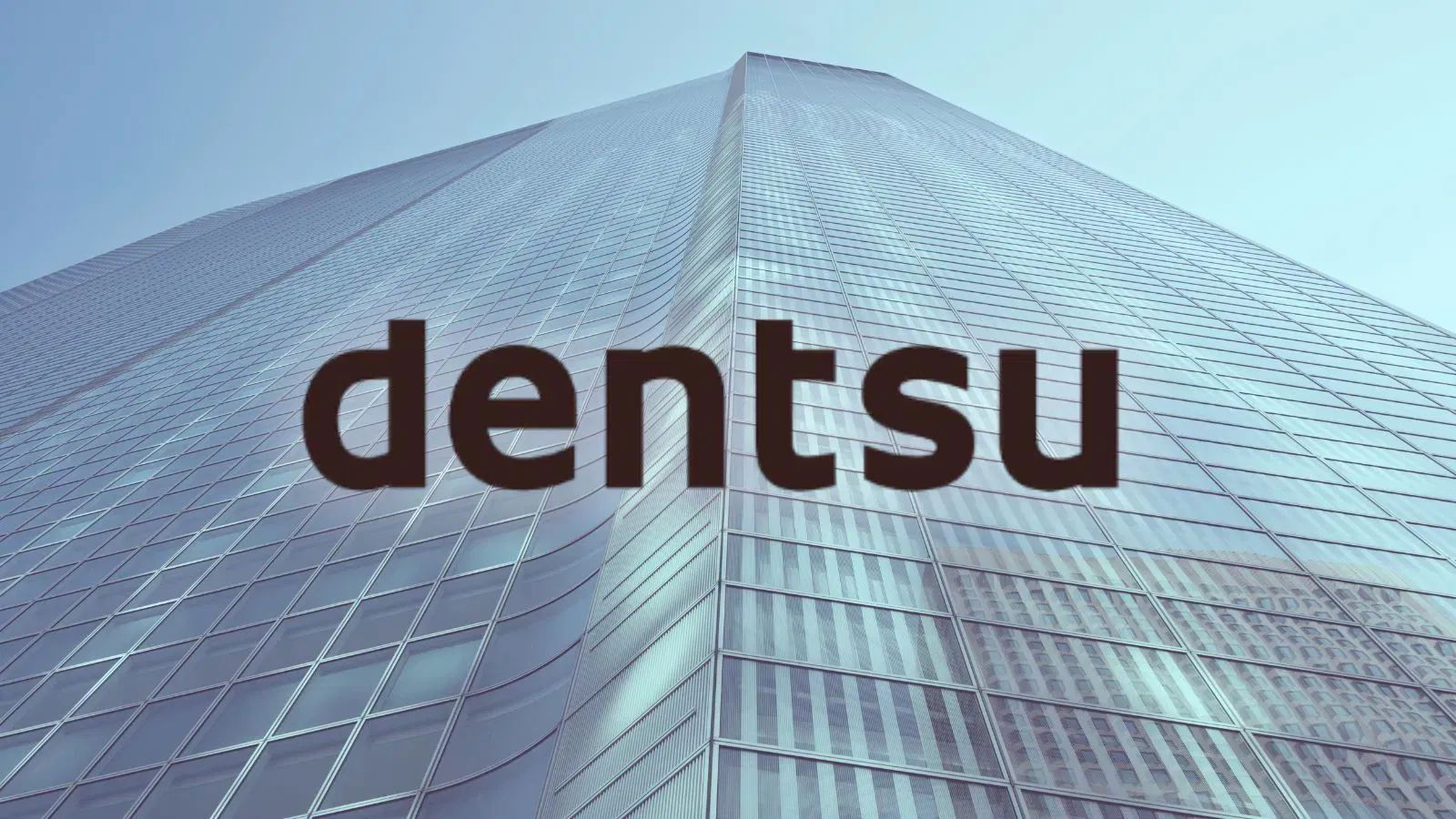 Dentsu dials back international sale plans, to slash 8% of workforce